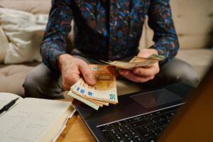 Man Counting Euro Banknotes, Financial Planning with Cash Money